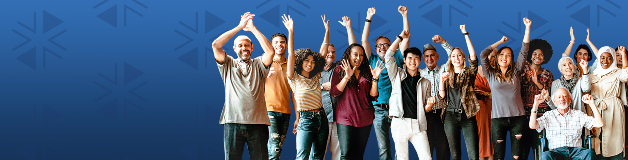 A diverse group of people in front of a blue background with their arms raised in celebration.