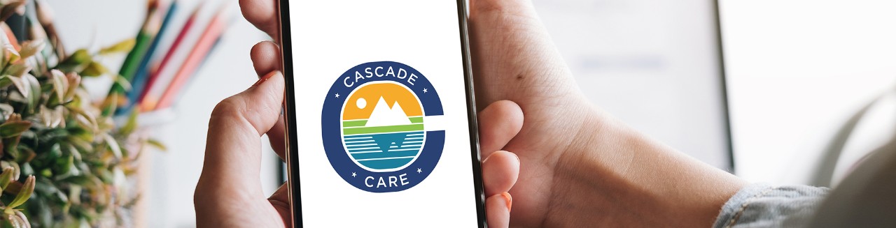 Cascade Care logo. A blue letter "c" surrounding a mountain graphic.
